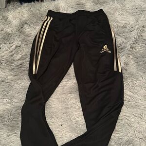 Adidas track pants gold logo